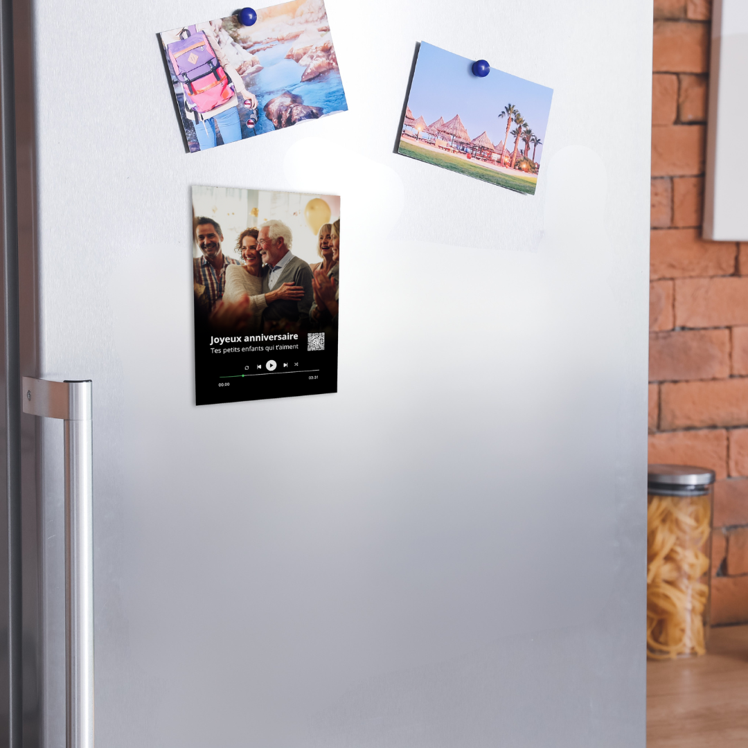 Hand holding a TailorTune custom magnet